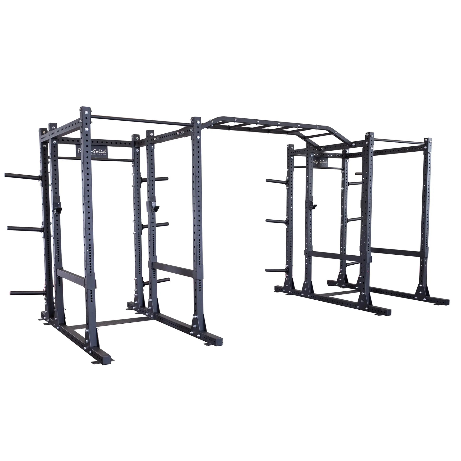 Image of the Body-Solid Pro ClubLine Double Extended Commercial Power Rack SPR1000DBBACK, featuring a sturdy steel construction with multiple bars and support structures designed for strength training and workouts.