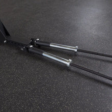 Close-up view of the Body-Solid Pro ClubLine Dual T-Bar Row Platform SPRTB, featuring chrome handles and a sturdy base on a textured gym floor.