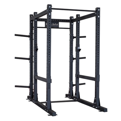 Image of a Body-Solid Pro ClubLine Extended Commercial Power Rack SPR1000BACK, featuring a sturdy black metal frame with multiple adjustment holes and safety bars.