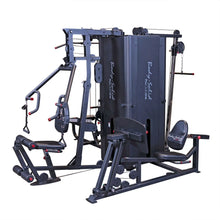Body-Solid Pro ClubLine Four-Stack Gym S1000, a multi-station gym equipment featuring various exercise options and a sleek black design.