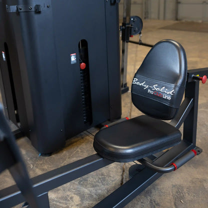 Close-up view of the Body-Solid Pro ClubLine Four-Stack Gym S1000 weight machine, featuring a padded seat and backrest.