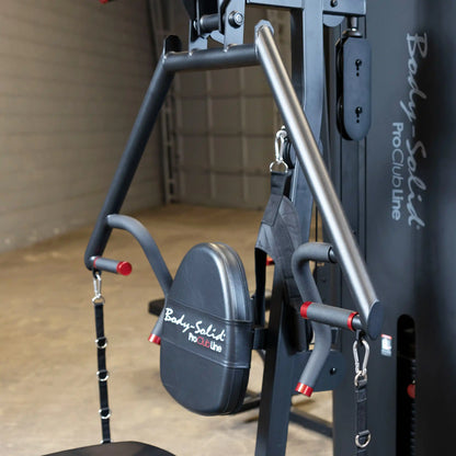 Close-up of the Body-Solid Pro ClubLine Four-Stack Gym S1000, showcasing the padded seat and handle attachments in a gym setting.