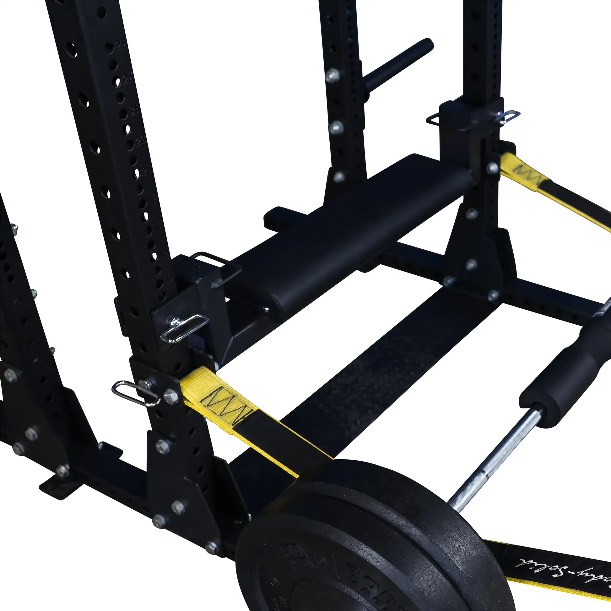 Image of the Body-Solid Pro ClubLine Hip Thrust Attachment SPRHT, showcasing a sturdy black frame with a padded support cushion, cable attachments, and a weight plate on the ground.