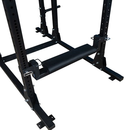 Close-up of the Body-Solid Pro ClubLine Hip Thrust Attachment SPRHT installed on a weightlifting rack, highlighting the sturdy construction and design for effective hip thrust exercises.