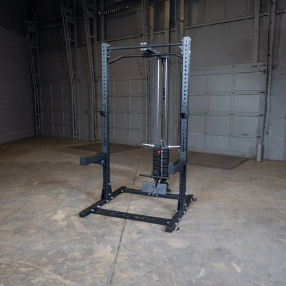 Body-Solid Pro ClubLine Lat Attachment SPRHLA displayed in an empty gym space, featuring a sturdy black frame and weight stack for lat exercises.