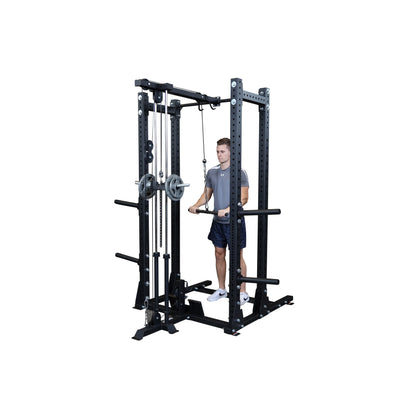 A person using the Body-Solid Pro ClubLine Lat Attachment SPRHLA, demonstrating a lat pulldown exercise on a multi-functional weight training machine.