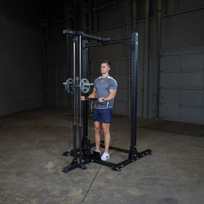 A man performing an exercise using the Body-Solid Pro ClubLine Lat Attachment SPRHLA in a gym setting, with a focus on strength training and fitness.