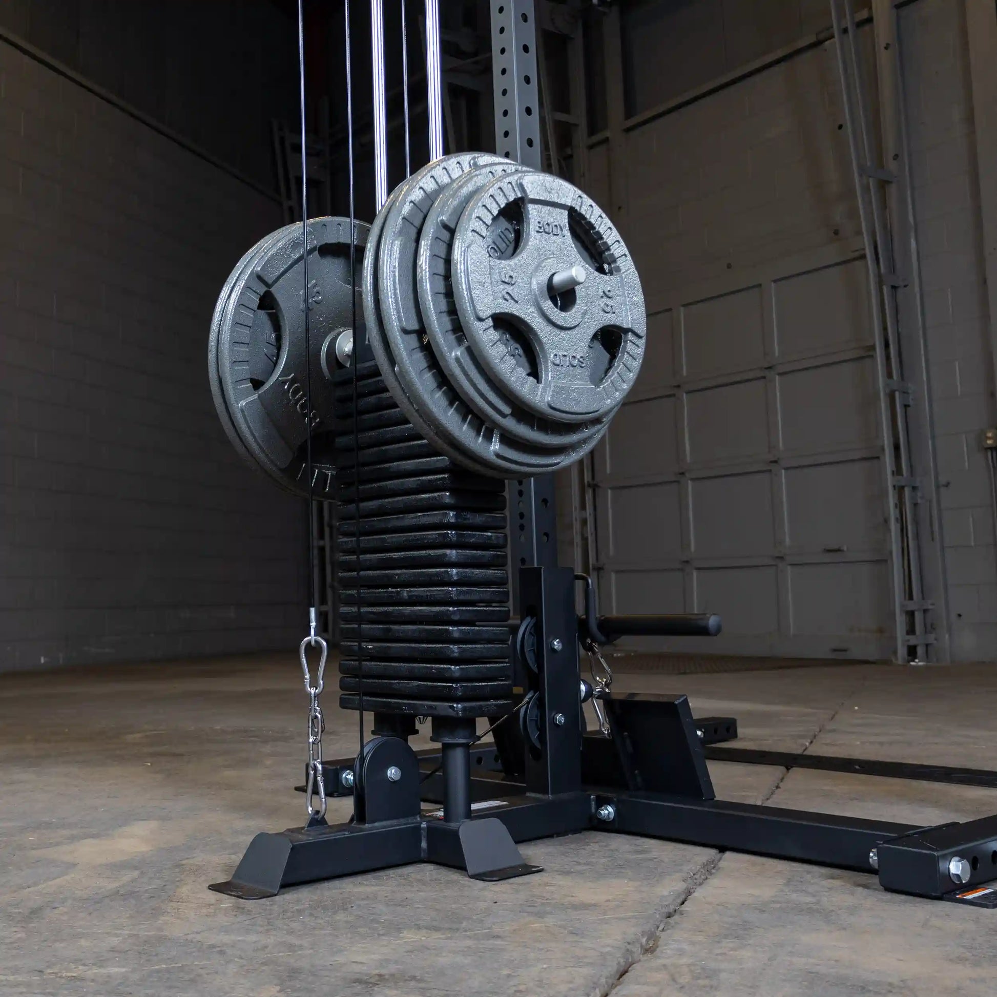 Image of the Body-Solid Pro ClubLine Lat Attachment SPRHLA featuring stacked weight plates and cables in a gym setting.