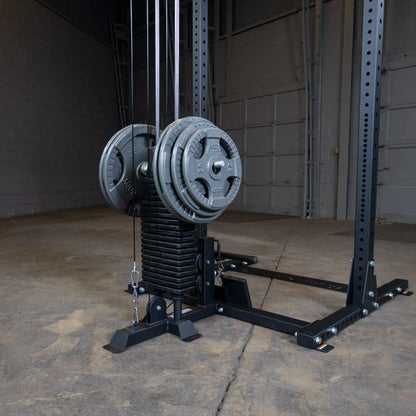 Image of the Body-Solid Pro ClubLine Lat Attachment SPRHLA, featuring a weight stack with plates and cables, set against a concrete floor in a spacious gym environment.