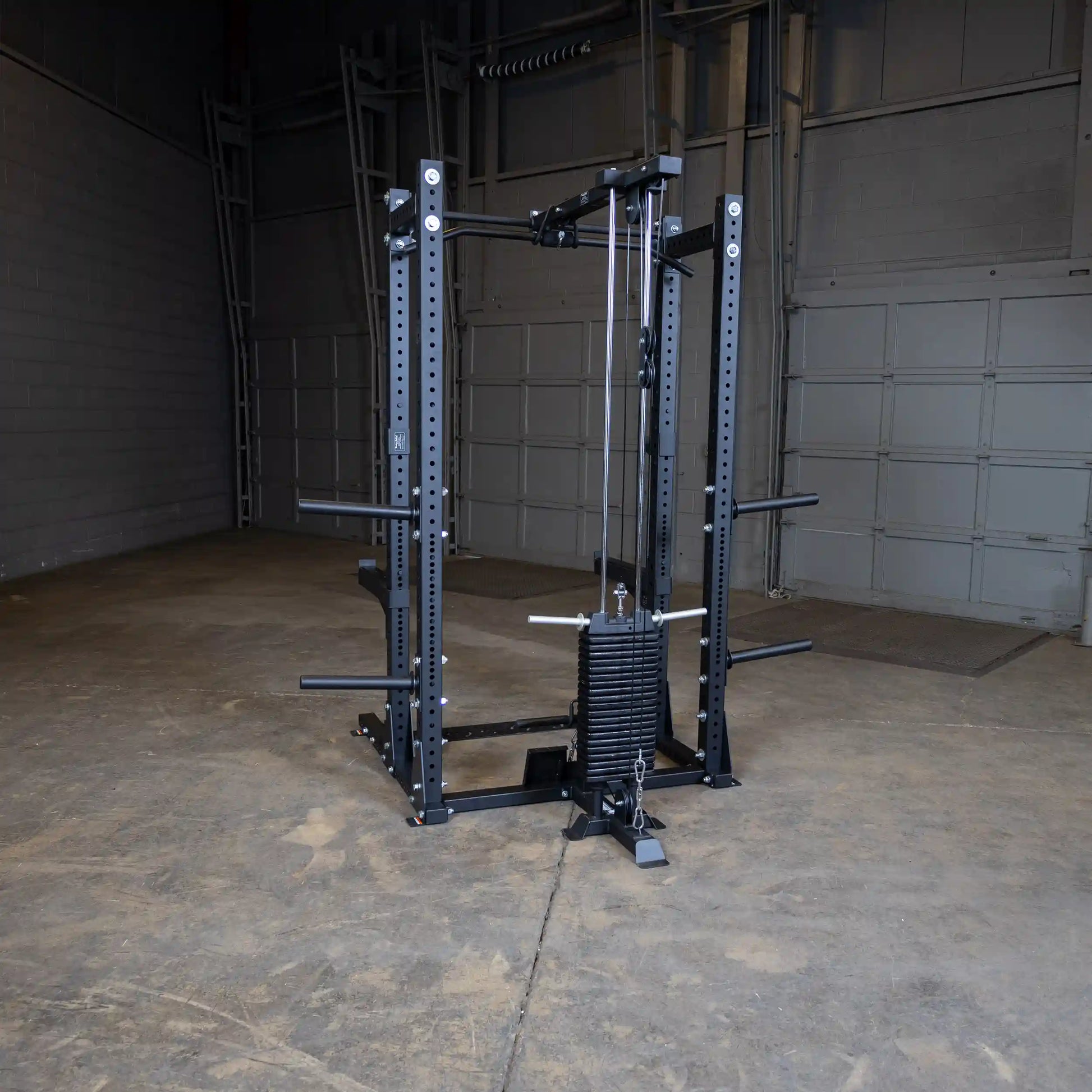 Body-Solid Pro ClubLine Lat Attachment SPRHLA attached to a sturdy weight rack in an industrial gym setting.