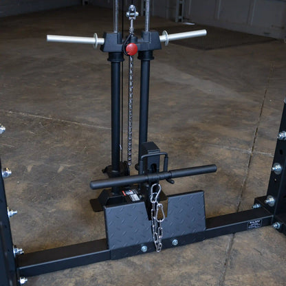 Image of the Body-Solid Pro ClubLine Lat Attachment SPRHLA, featuring dual vertical columns, a pull-down bar, and a chain mechanism on a gym floor.