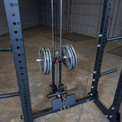 Image of the Body-Solid Pro ClubLine Lat Attachment SPRHLA featuring weight plates and a cable system, mounted on a sturdy rack in a spacious gym setting.