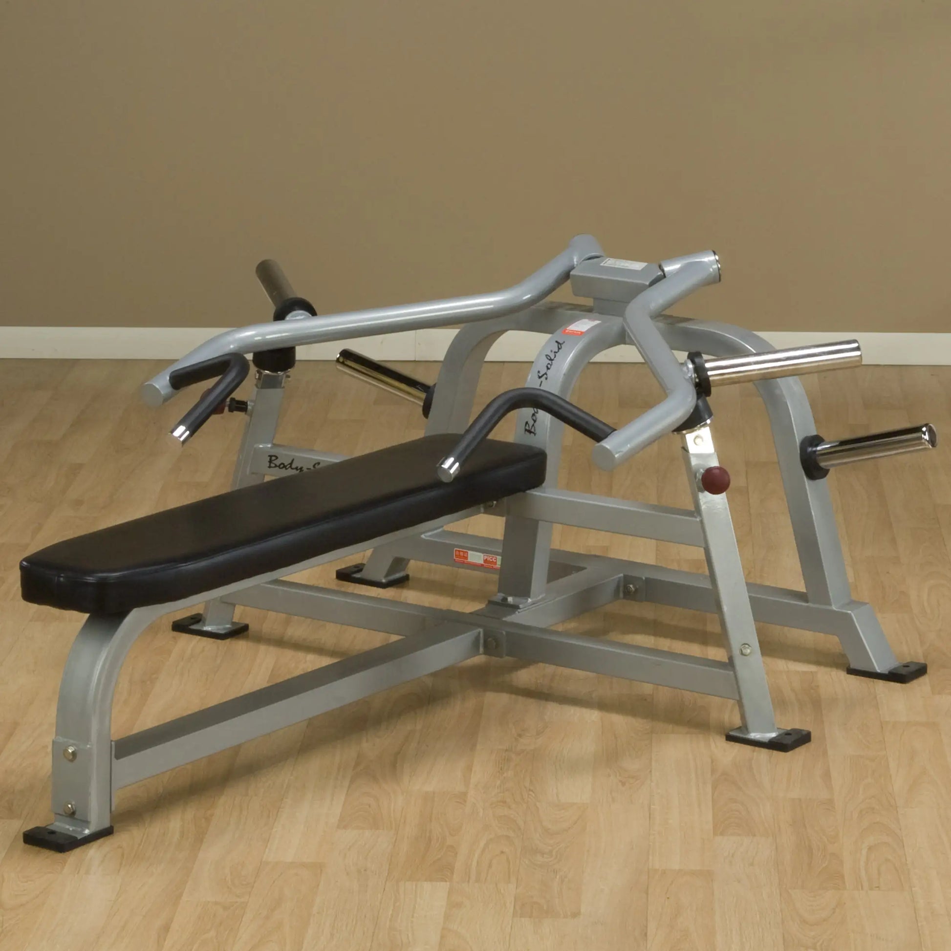 Body-Solid Pro ClubLine Leverage Bench Press LVBP, featuring a sturdy frame and padded bench, designed for strength training in a gym setting.