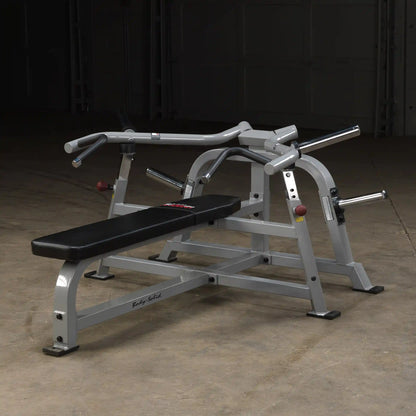Body-Solid Pro ClubLine Leverage Bench Press LVBP, featuring a sturdy design with a padded bench and adjustable handles, set against a dark background.