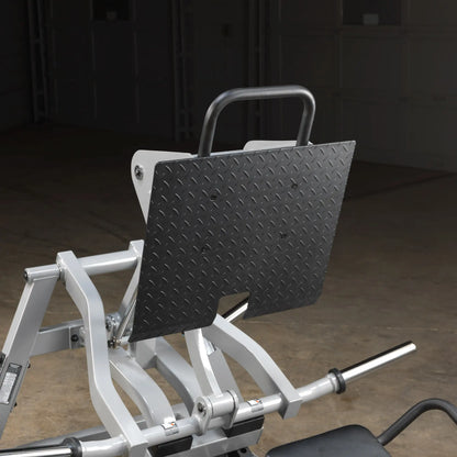 Close-up view of the Body-Solid Pro ClubLine Leverage Horizontal Leg Press Machine LVLP, showcasing the textured feet placement location and supporting frame.