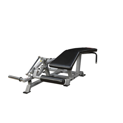 Body-Solid Pro ClubLine Leverage Leg Curl Machine LVLC, featuring a padded seat and leg support, designed for effective leg curl exercises.
