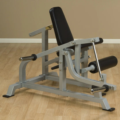 Body-Solid Pro ClubLine Leverage Leg Extension Machine LVLE, featuring a padded seat and leg support, designed for leg extension exercises, set against a neutral background.