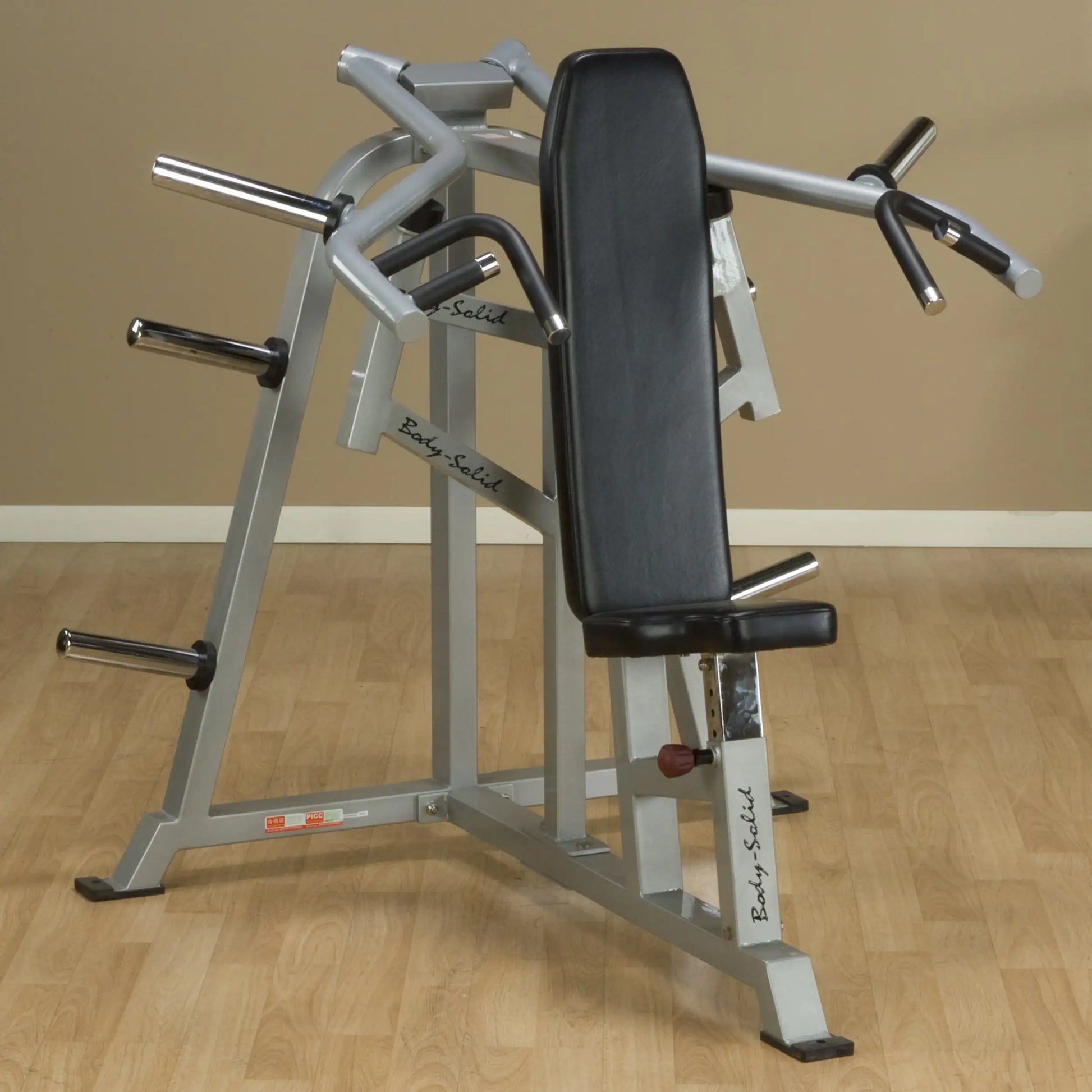 Body-Solid Pro ClubLine Leverage Shoulder Press Machine LVSP, featuring a padded seat and adjustable arm positions, set against a neutral background.