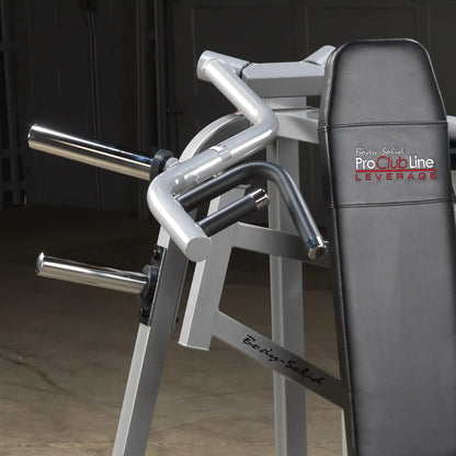 Close-up view of the Body-Solid Pro ClubLine Leverage Shoulder Press Machine LVSP, showcasing its ergonomic handles and padded seat.