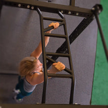 Aerial view of a person using the Body-Solid Pro ClubLine Multi Chin-Up Attachment SPRCUA, gripping the multi chin-up bar in a fitness setting.
