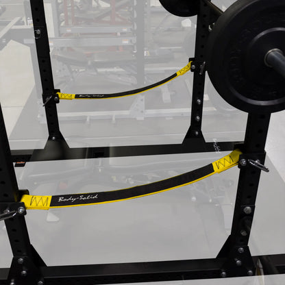 Close-up of Body-Solid Pro ClubLine Power Rack Safety Straps SPRSS installed on a power rack, showcasing the black and yellow design.