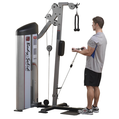 A person using the Body-Solid Pro ClubLine Series 2 Bicep & Tricep Machine S2BTP, performing an exercise with a rope attachment, in a gym setting.
