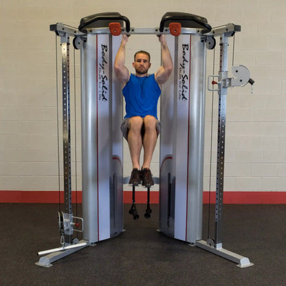 Man performing an exercise on the Body-Solid Pro ClubLine Series 2 Functional Trainer S2FT, showcasing strength training in a gym setting.