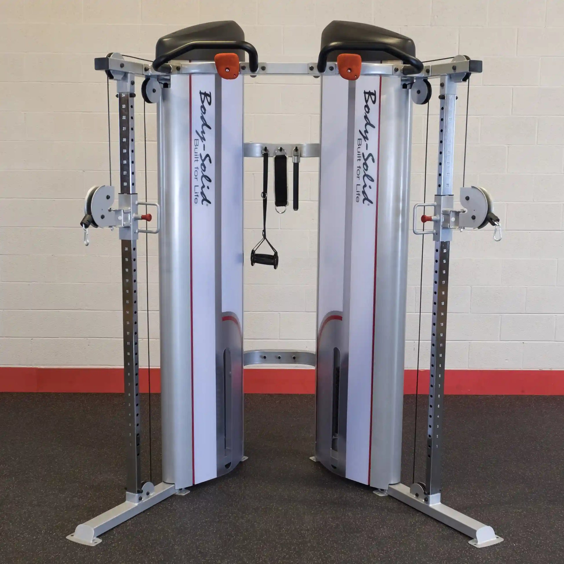 Body-Solid Pro ClubLine Series 2 Functional Trainer S2FT, a dual cable machine with adjustable pulleys and handles, set against a plain wall and rubber flooring.