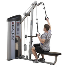 A person using the Body-Solid Pro ClubLine Series 2 Lat Pulldown & Seated Row Machine S2LAT for a workout, demonstrating proper form while performing a lat pulldown exercise.