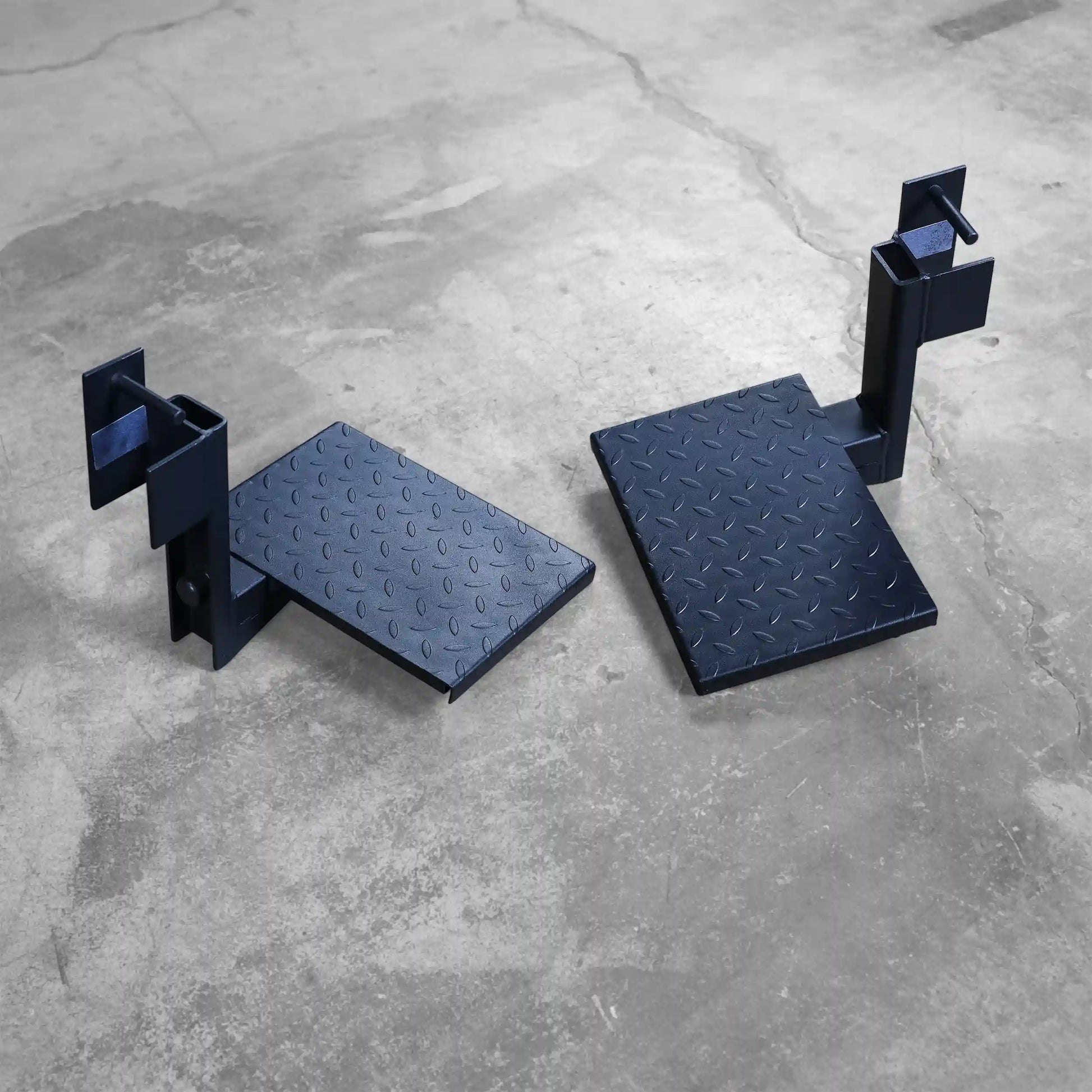 Body-Solid Pro ClubLine Spotter Platforms SPRSP displayed on a concrete floor, featuring a textured surface for enhanced grip.