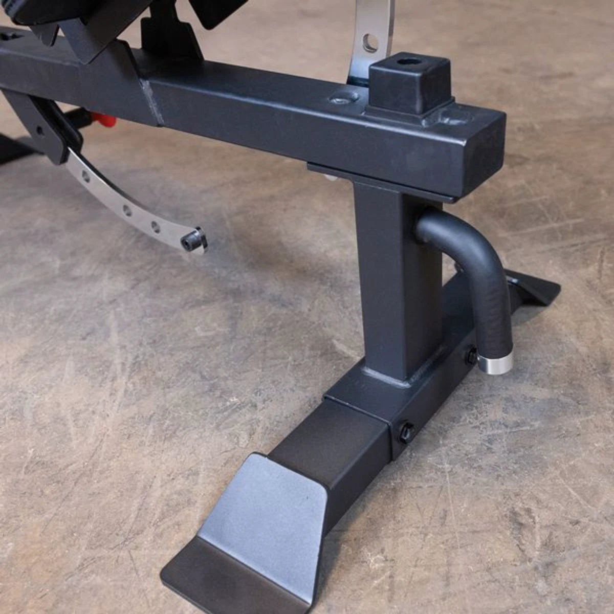 Close-up view of the Body-Solid Pro Clubline Flat/Incline Bench SFI20, highlighting its sturdy metal frame and adjustable components.