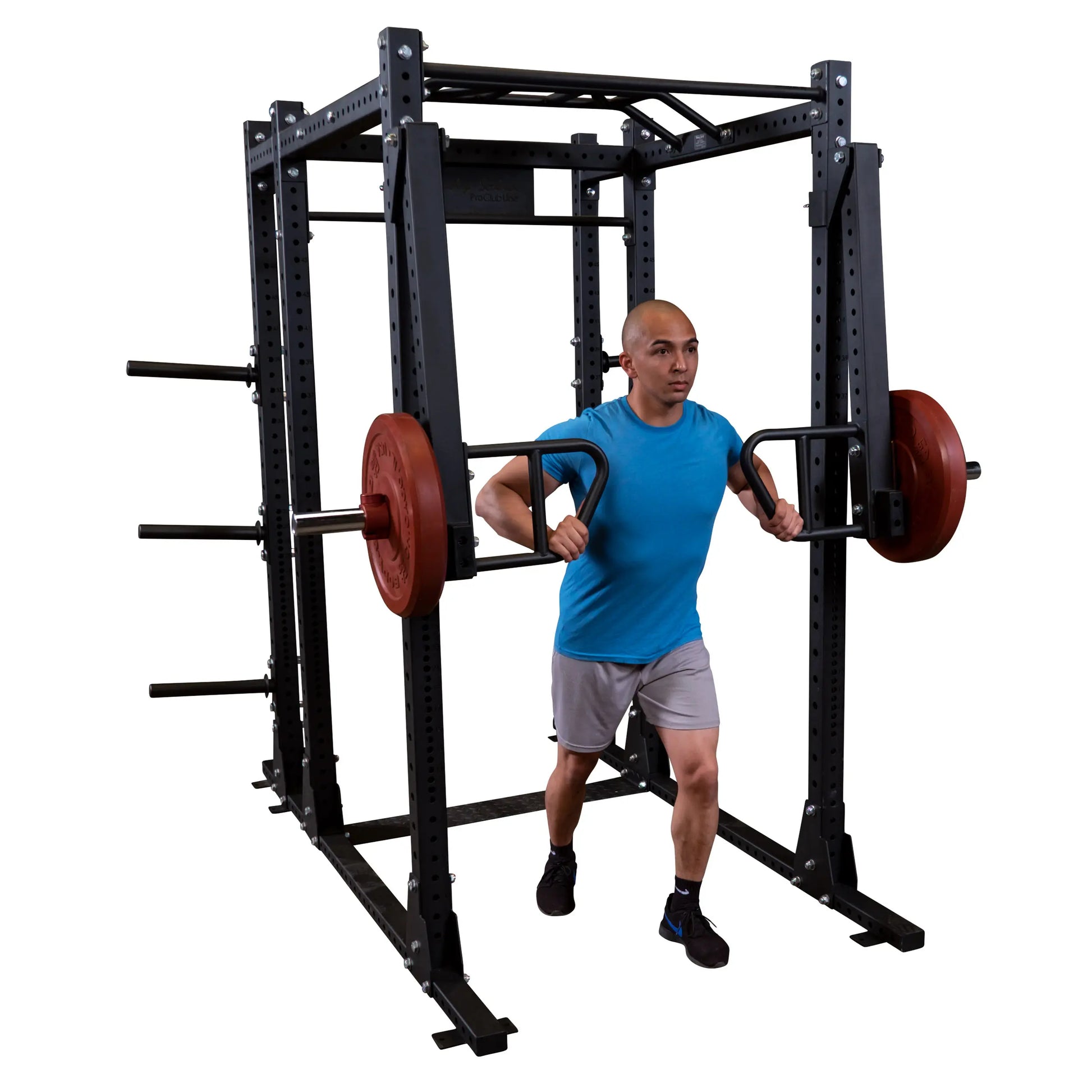 A person using the Body-Solid Pro Clubline Jammer Arms SPRJAM equipment for strength training.