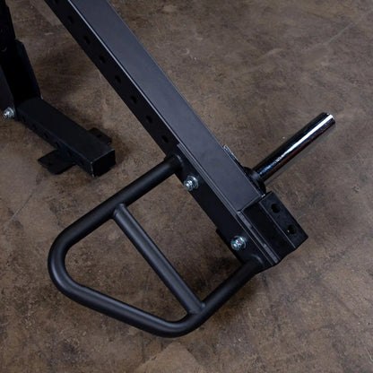 Close-up of the Body-Solid Pro Clubline Jammer Arms SPRJAM, showcasing the attachment point and handle design on a gym floor.