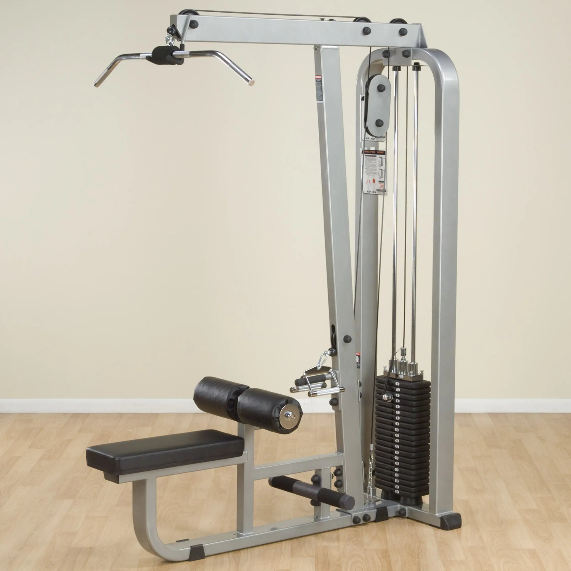 Body-Solid Pro Clubline Lat & Mid Row Machine SLM300G2, featuring a chrome handle, adjustable seat, and weight stack, set against a light-colored wall.