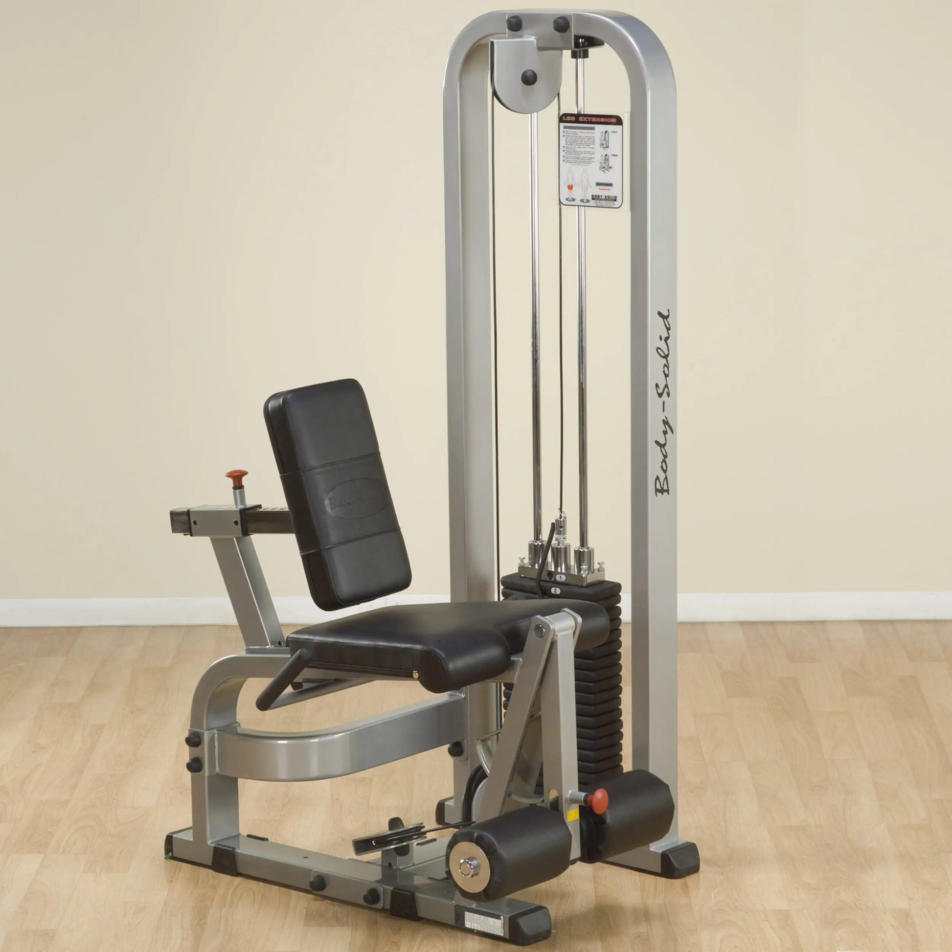 Body-Solid Pro Clubline Leg Extension Machine SLE200G2 featuring a padded seat and adjustable backrest, designed for leg extension exercises in a gym setting.