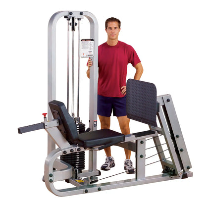 Body-Solid Pro Clubline Leg Press Machine SLP500G2 with a person standing beside it, showcasing its design and features.