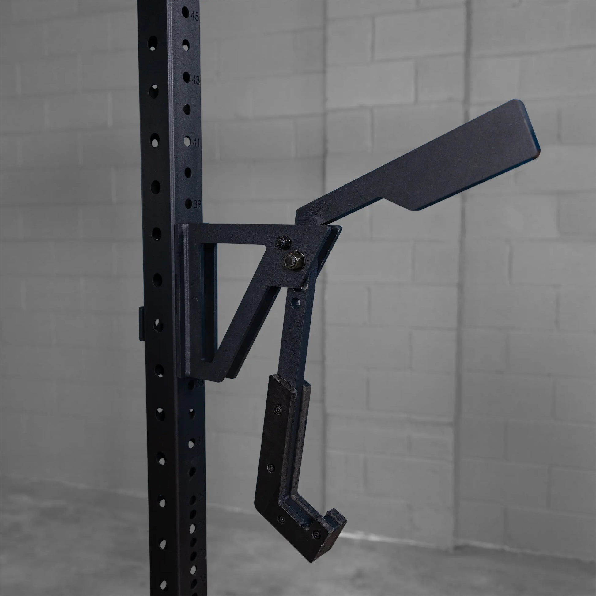 Body-Solid Pro Clubline Monolift Attachment SPRLFT mounted on a squat rack, designed for enhanced weightlifting performance.
