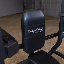 Close-up of the Body-Solid Pro Clubline Shoulder Olympic Bench SOSB250, featuring a padded black seat and backrest with the Body-Solid logo.