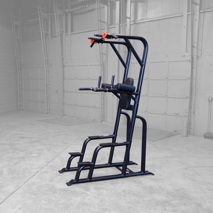 Body-Solid Pro Clubline Vertical Knee Raise SVKR1000, a sturdy exercise equipment designed for vertical knee raises, featuring padded support and multiple grips, set in a spacious gym environment.
