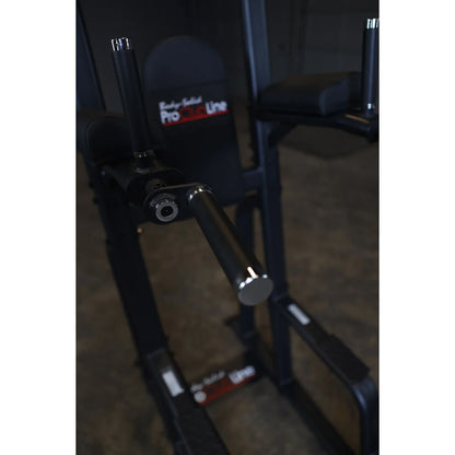 Close-up view of the Body-Solid Pro Clubline Vertical Knee Raise SVKR1000, showcasing the padded support and vertical handles.