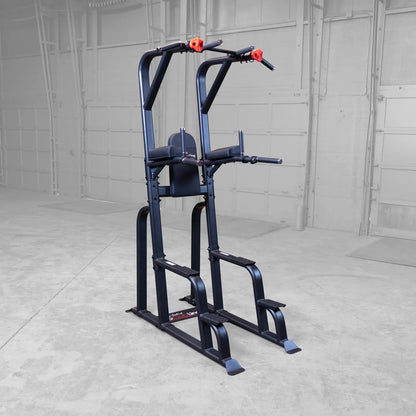 Body-Solid Pro Clubline Vertical Knee Raise SVKR1000 fitness equipment in a gym setting.