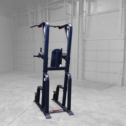 Body-Solid Pro Clubline Vertical Knee Raise SVKR1000 exercise equipment in a gym setting.