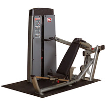 Body-Solid Pro Dual Multi-Press Machine DPRSSF featuring adjustable seat and backrest on a rubber mat.