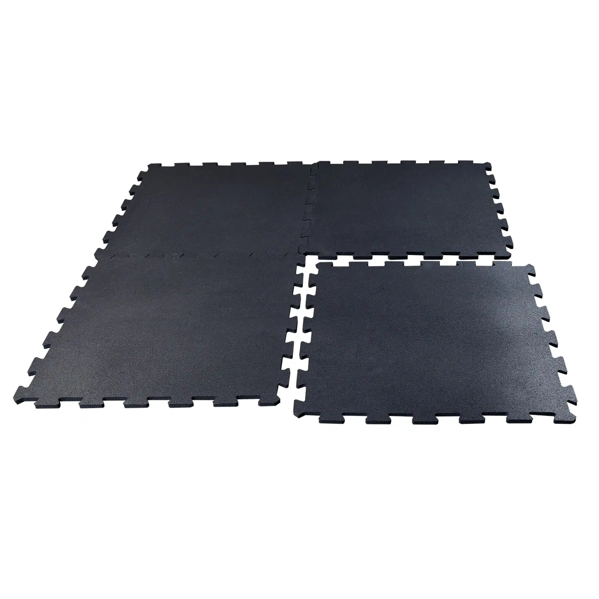 Black interlocking rubber gym floor tiles, ideal for home workout spaces.
