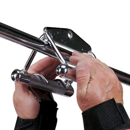 Hands gripping a chrome lat pulldown attachment with knurled handles for better grip.