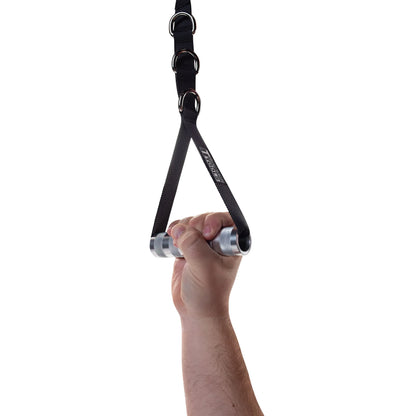 Rogue stainless steel gymnastic ring grip held by hand.