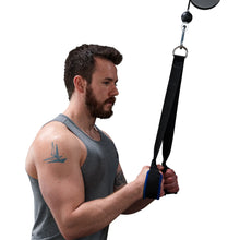 Man using cable pulley system with wrist support in a gym workout.