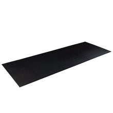 Black anti-slip rubber mat with diamond pattern for safety flooring.