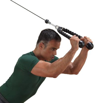 Man performing tricep pushdown exercise with a black cable rope attachment.