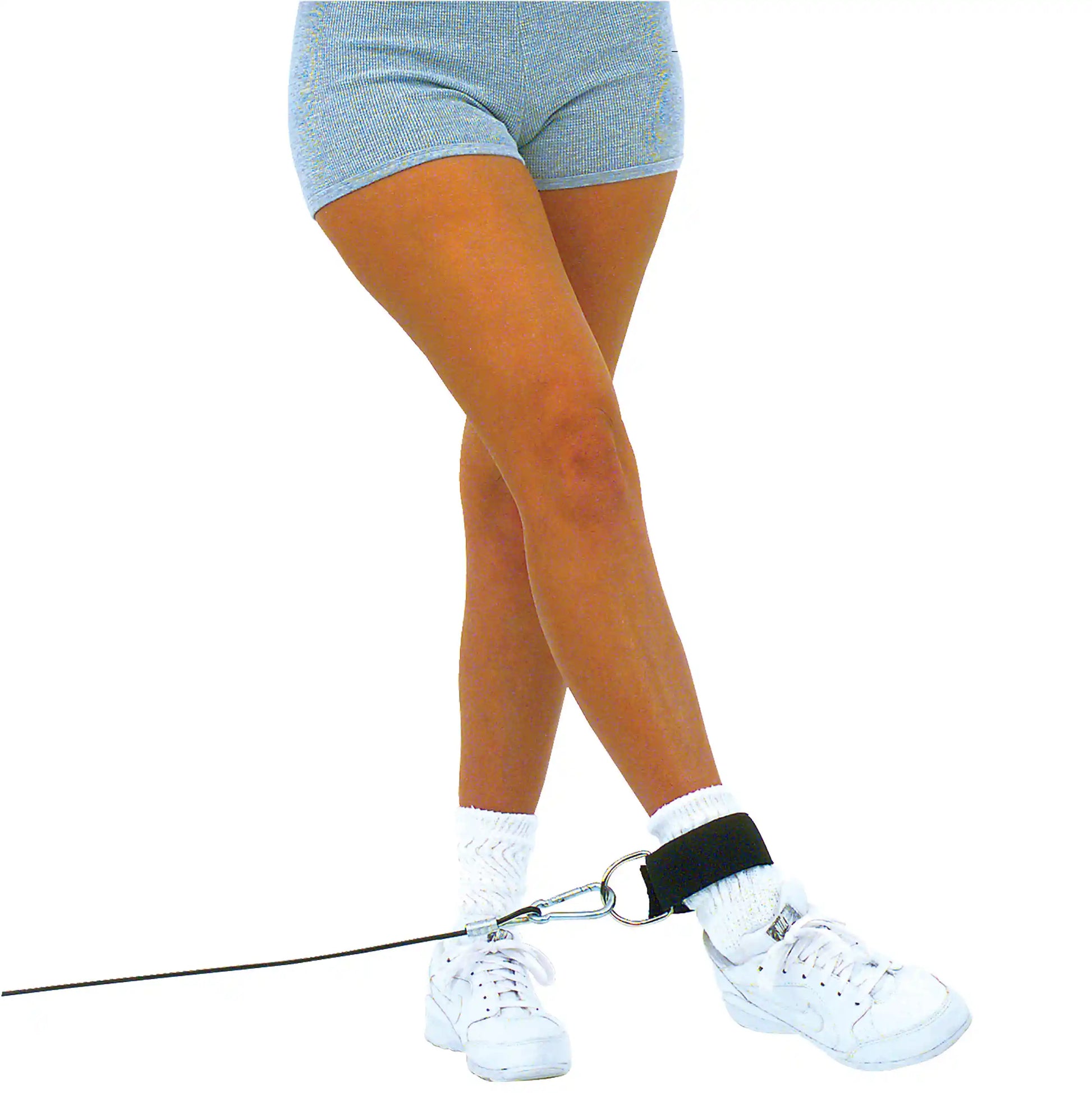 Ankle strap on leg with cable attachment for resistance training.